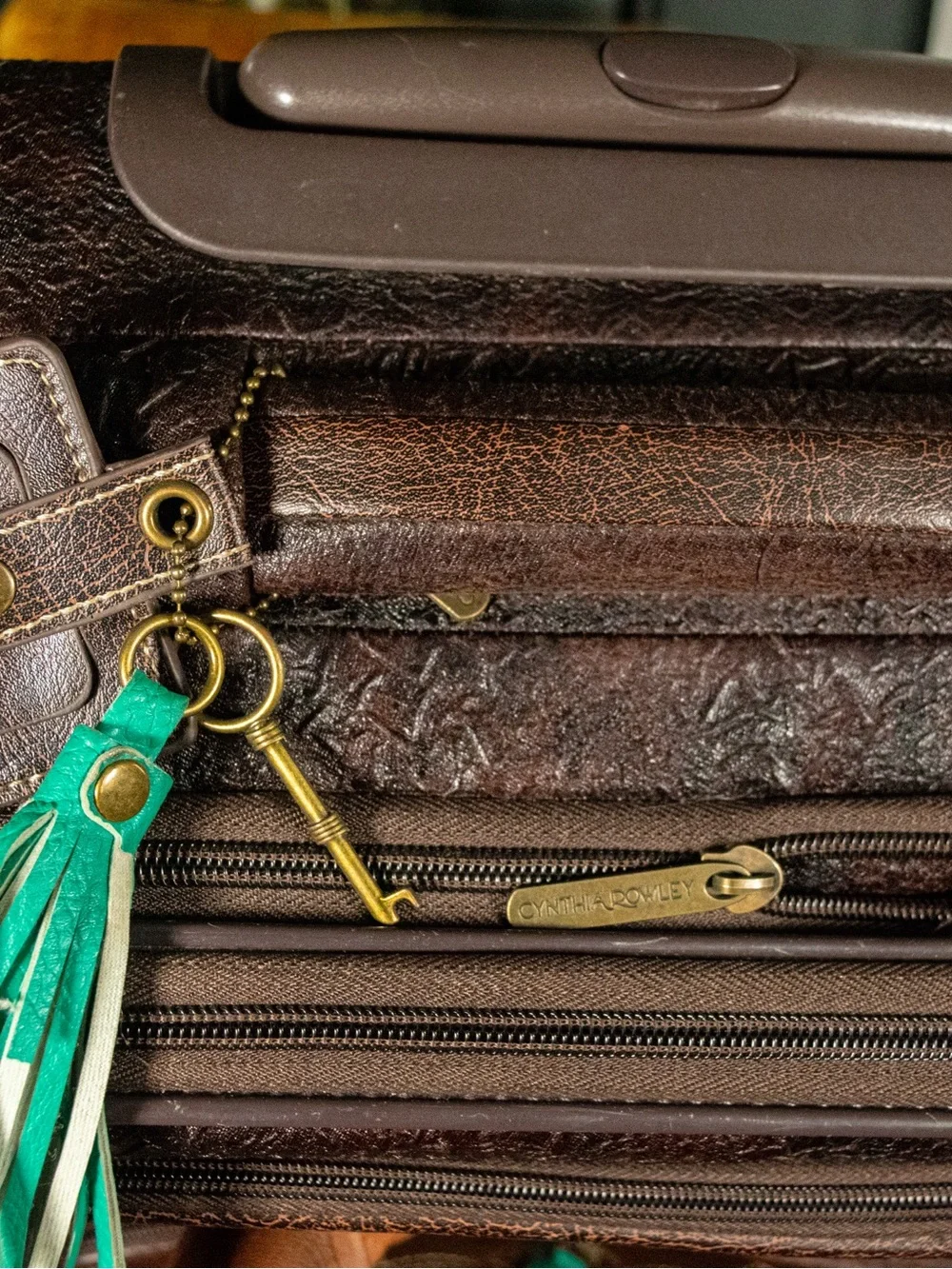 Cynthia Rowley Brown Carry-On Spinner with Teal Accents